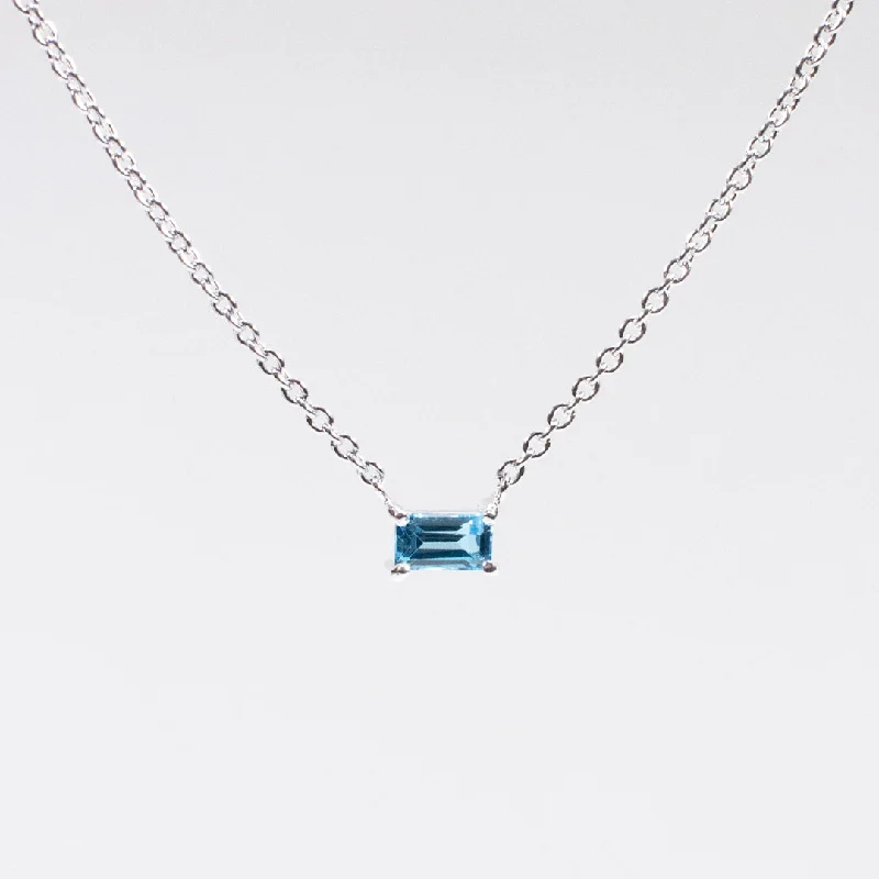 Silver Baguette Solitaire Blue Topaz Necklace