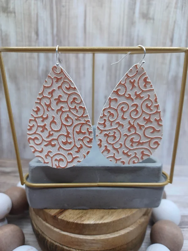 White Whimsical Leather Style Embossed Earrings